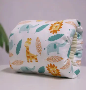 Baby diaper with a colorful animal pattern on a light gray background