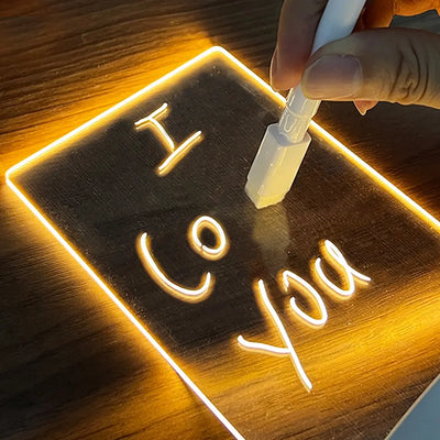 Neon sign with 'I love you' text on a wooden background