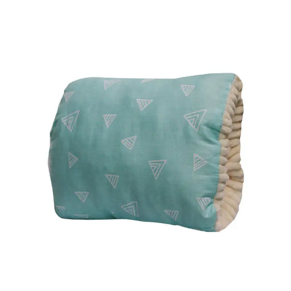 Teal blanket with triangle patterns on a white background
