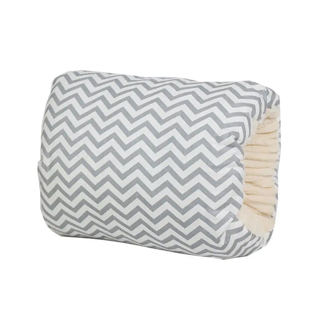 Rectangular pillow with gray and white zigzag pattern on a white background