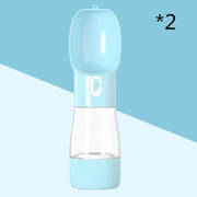Traveling Out Portable Dog Water Dispenser in blue with leak-proof design and dual compartments for water and food.