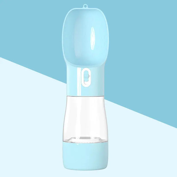 Traveling Out Portable Dog Water Dispenser in blue with silicone seal and push-button water release for pets on the go.