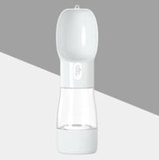Traveling Out Portable Dog Water Dispenser showing white easy-pour pet water bottle with locking switch