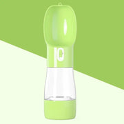 Traveling Out Portable Dog Water Dispenser in green with leak-proof design and detachable water and food compartments.