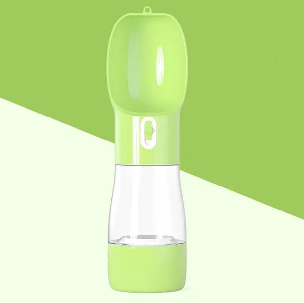 Traveling Out Portable Dog Water Dispenser in green with leak-proof design and detachable water and food compartments.