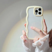 Phone case with a unique design held by a person against a neutral background