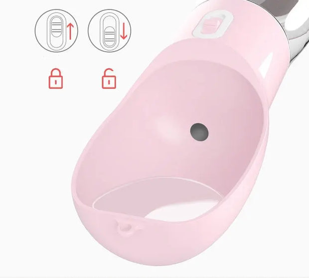 Traveling Out Portable Dog Water Dispenser in pink showing water lock mechanism and anti-leak design close-up.