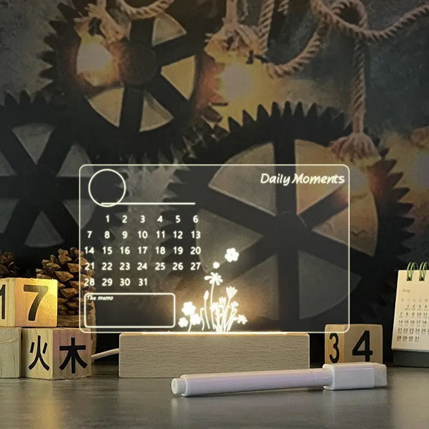 Transparent calendar with floral design on a dark background with gears and wooden blocks.
