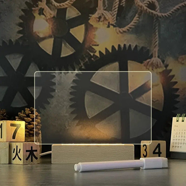 Decorative setup with gears, wooden blocks, and a calendar in front of a dark textured background.