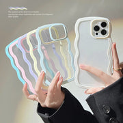 Phone case with wavy design held by a person against a neutral background